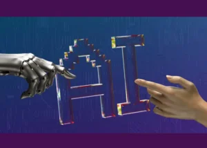 the hand of a robot and person reaching eachother with the letter AI in the middle