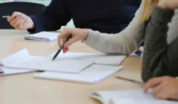 blc spain master's students studying together, reviewing notes and homework